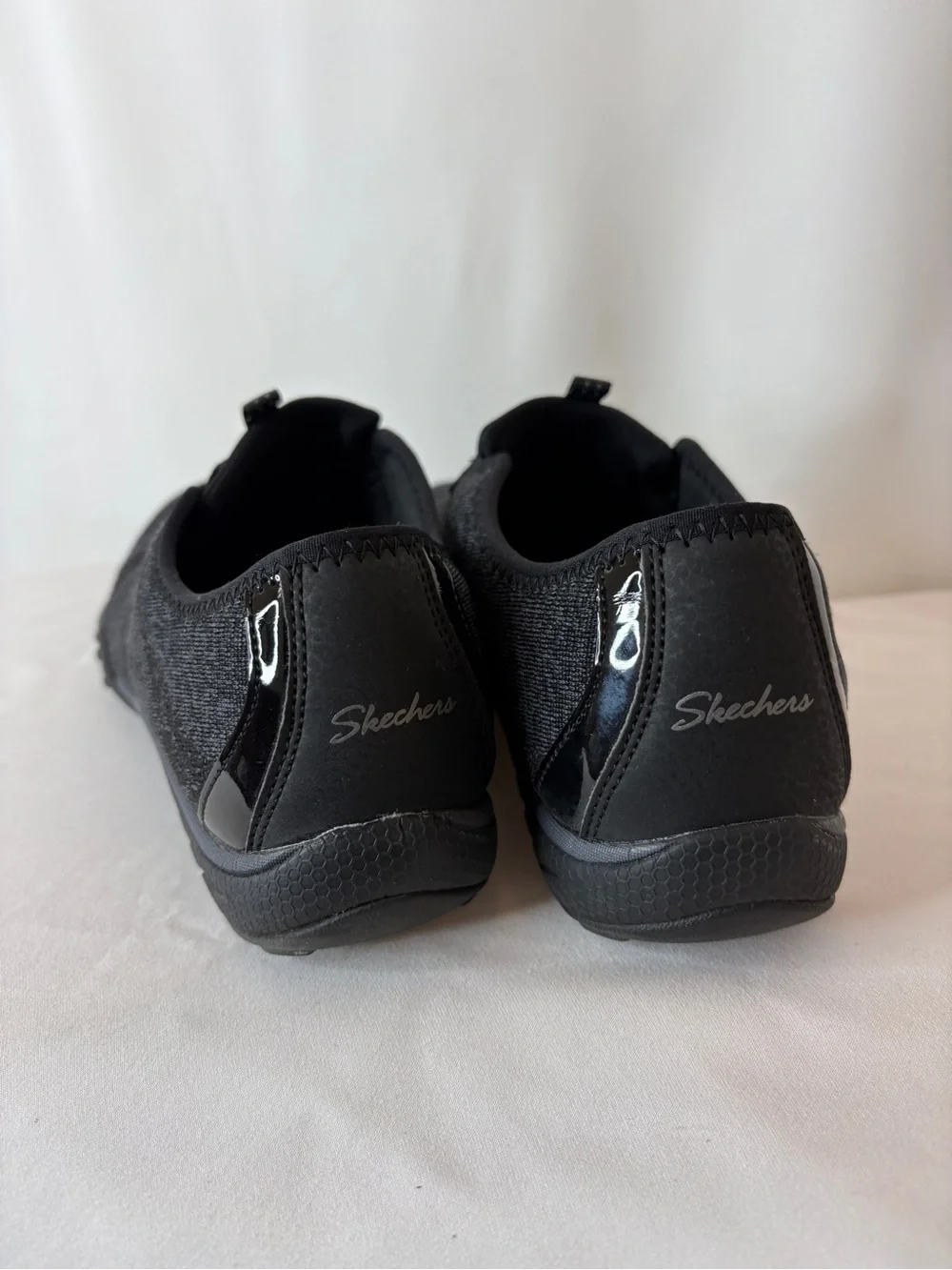 Skechers Women's Black Knit Slip-On Sneakers